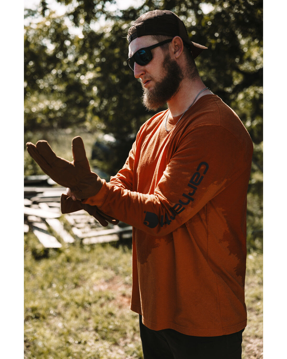 Image #1 - Carhartt Men's Loose Fit Heavyweight Long Sleeve Graphic Work T-Shirt, Heather Orange, hi-res