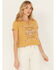 Image #1 - Wild Crow Women's Wild Birds Grommet Short Sleeve Graphic Tee, Mustard, hi-res