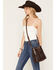 Image #1 - Shyanne Women's Palmer Tooled Leather Crossbody Bucket Bag, Brown, hi-res