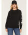 Image #1 - Carhartt Women's FR Force&reg; Relaxed Fit Midweight Logo Sleeve Graphic Sweatshirt, Black, hi-res