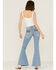 Image #1 - Shyanne Women's Mid Rise Southwestern Pocket Flare Jeans, Light Wash, hi-res