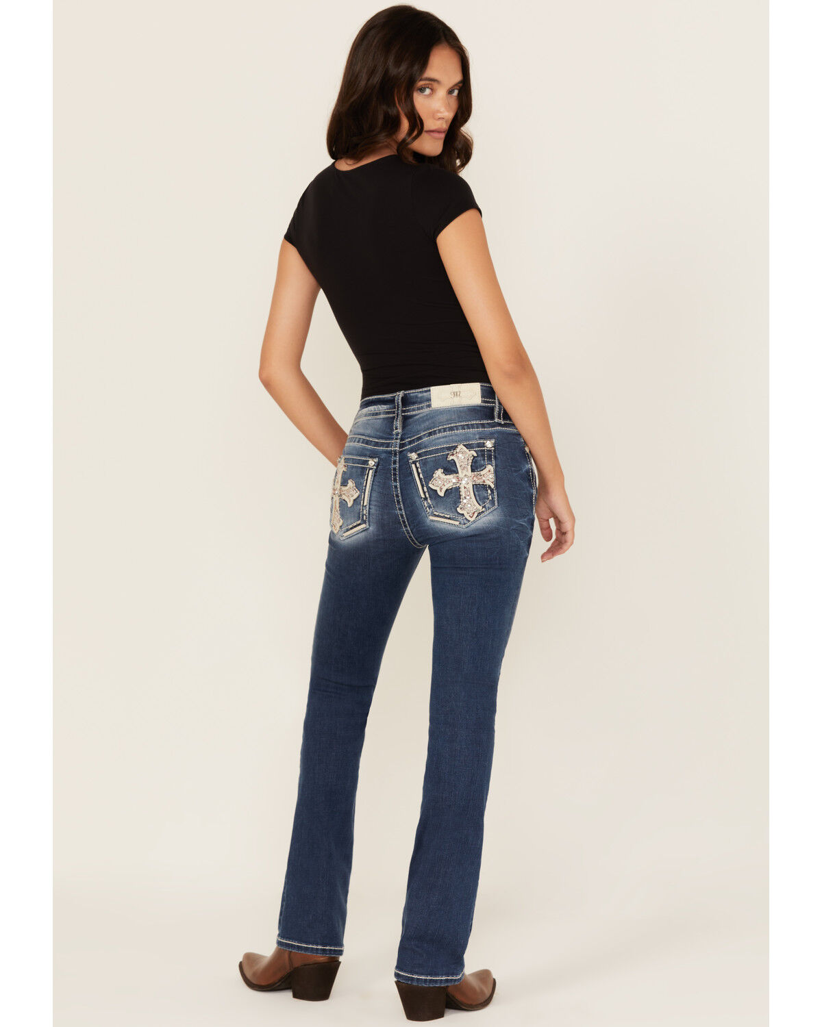 Image #1 - Miss Me Women's Dark Wash Mid Rise Cross Pocket Slim Bootcut Stretch Denim Jeans, Medium Wash, hi-res
