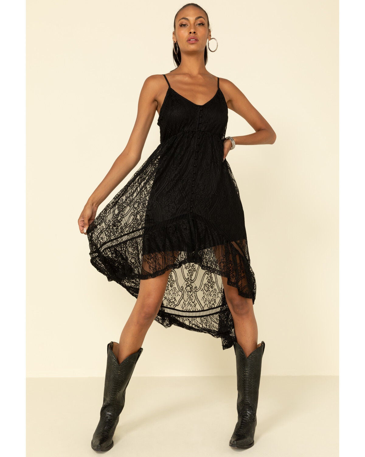 black lace dress with cowboy boots