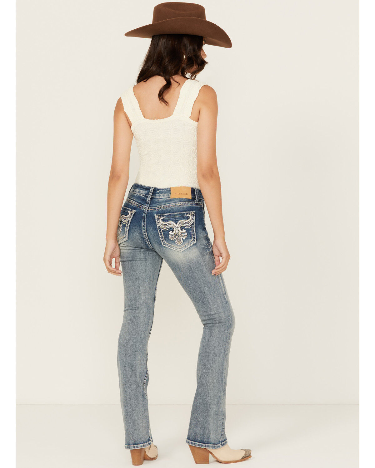 Image #1 - Shyanne Women's Embroidered Pocket Light Wash Mid Rise Bootcut Stretch Denim Jeans, Light Wash, hi-res