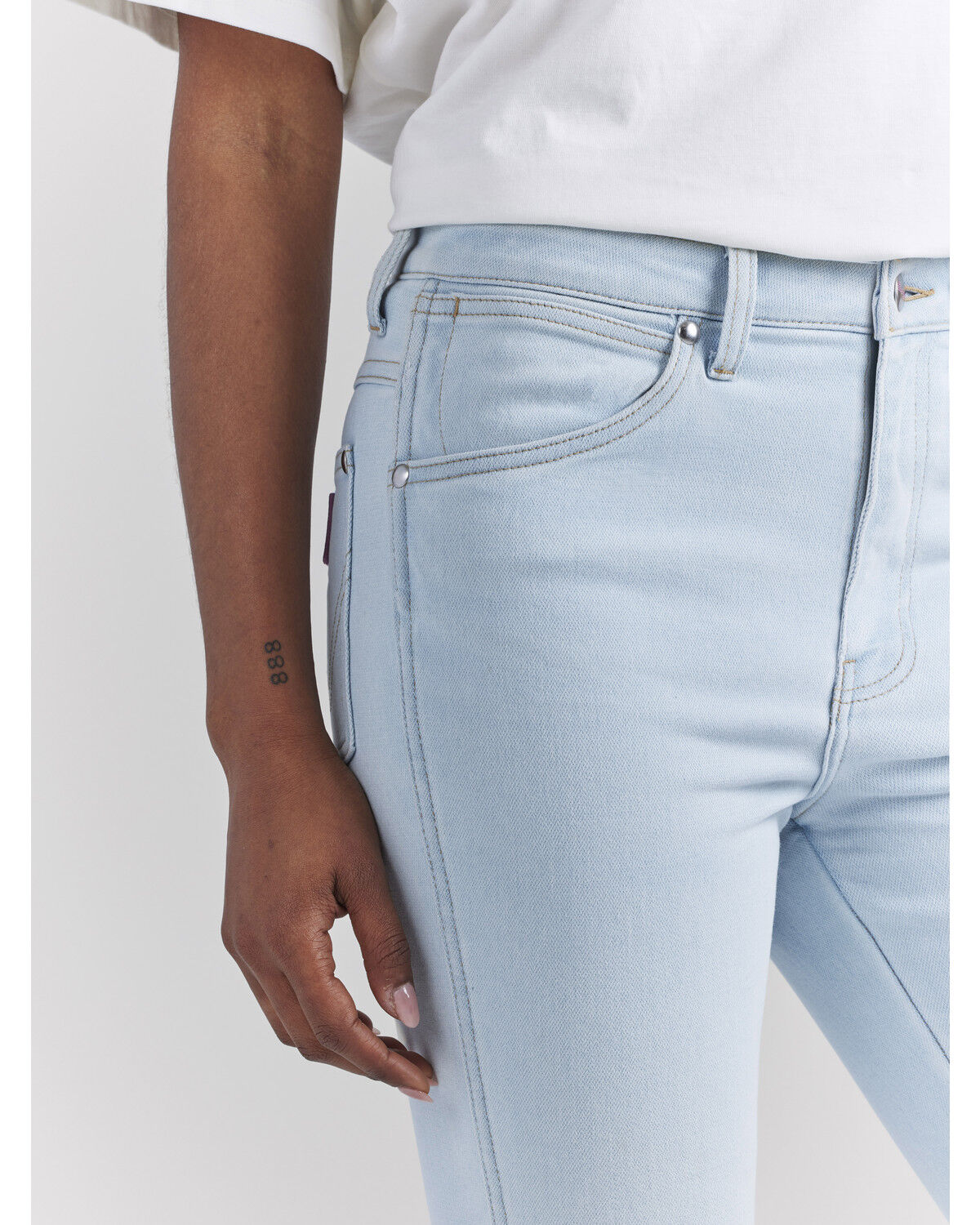 Image #4 - Wrangler® X Barbie™ Women's Light Wash High Rise Westward Pink Patch Stretch Bootcut Jeans, Light Wash, hi-res