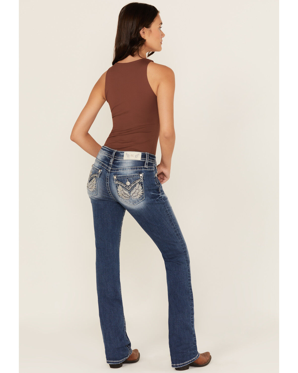 Image #1 - Miss Me Women's Medium Wash Mid Rise Winged Pocket Bootcut Stretch Denim Jeans, Medium Wash, hi-res