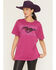 Image #1 - Merch Traffic Women's Ford Mustang Short Sleeve Graphic Tee, Pink, hi-res