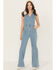Image #2 - Flying Tomato Women's Light Wash Open Back Denim Jumpsuit, Light Wash, hi-res