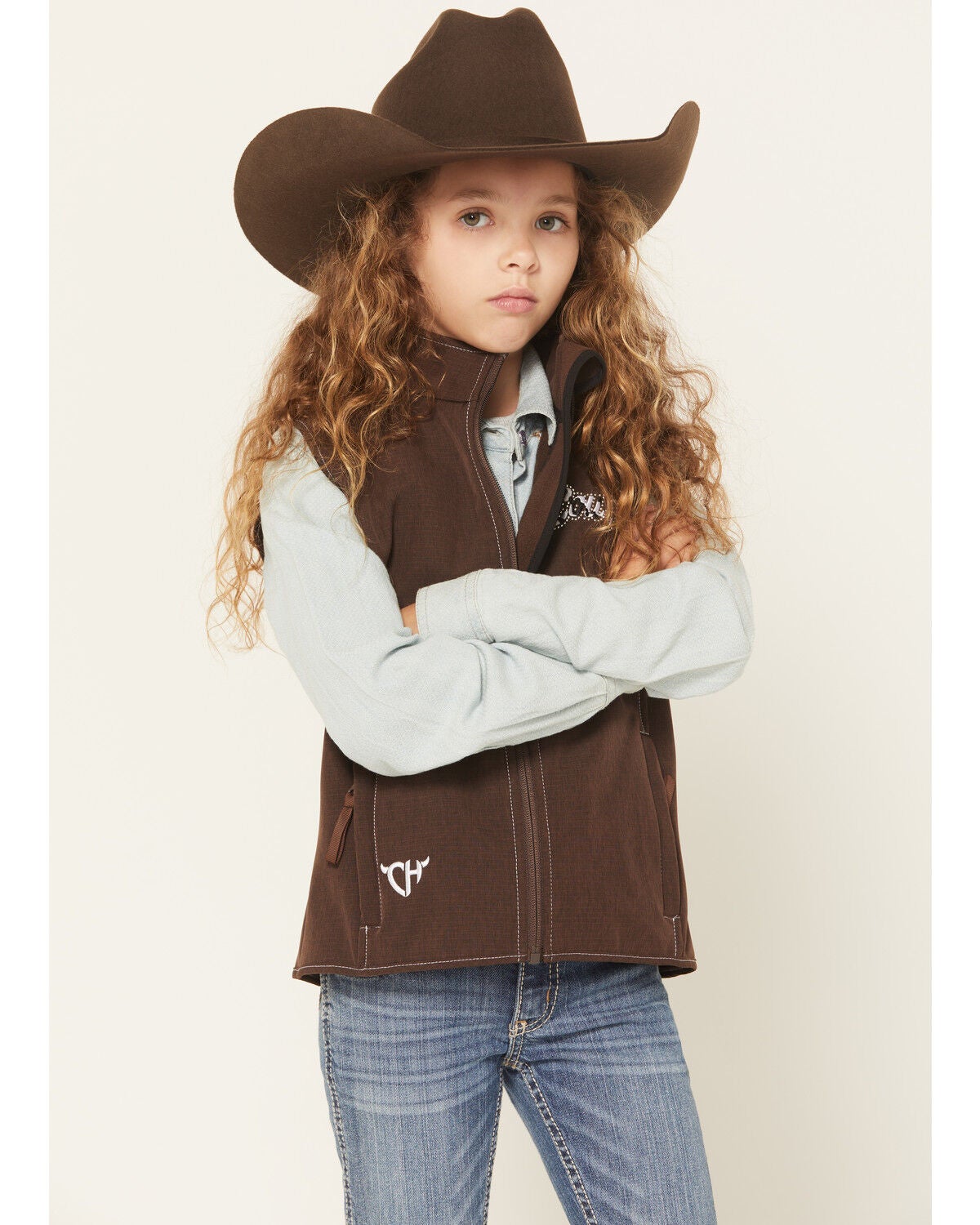 Image #1 - Cowgirl Hardware Girls' Cowgirl Cowhide Print Softshell Vest, Brown, hi-res