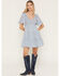 Image #1 - Yura Women's Boot Barn Exclusive Floral Print Smocked Front Tiered Mini Dress, Blue, hi-res