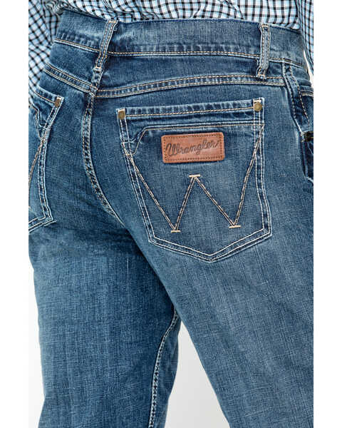Wrangler Retro Men's Layton Medium Wash Low Rise Slim Bootcut Jeans |  Sheplers