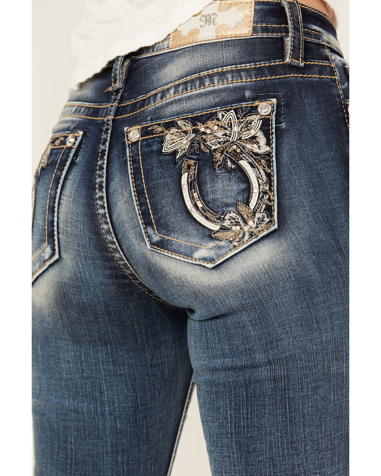 Product Name: Miss Me Women's Dark Wash Mid Rise Floral Horseshoe ...