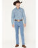 Image #1 - Wrangler Men's 13MWZ Tough Lite Medium Wash Cowboy Cut Straight Stretch Denim Jeans, Medium Wash, hi-res