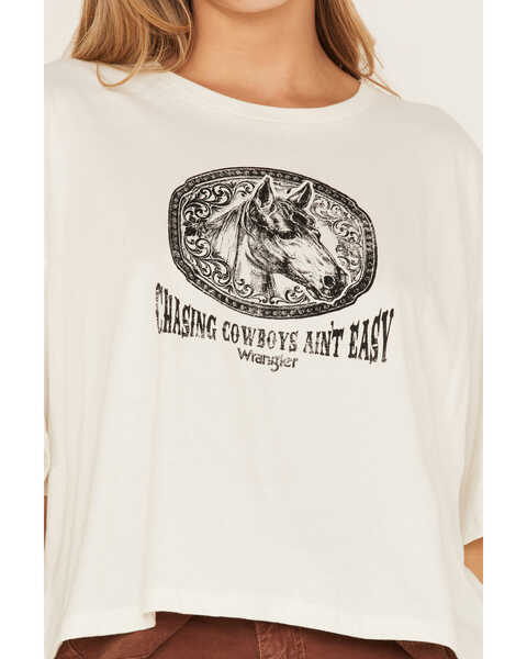 Wrangler Women's Chasing Cowboys Ain't Easy Cropped Graphic Tee, White, hi-res