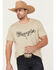 Image #1 - Wrangler Men's Rope Steer Head Front Logo Short Sleeve Graphic T-Shirt, Sand, hi-res