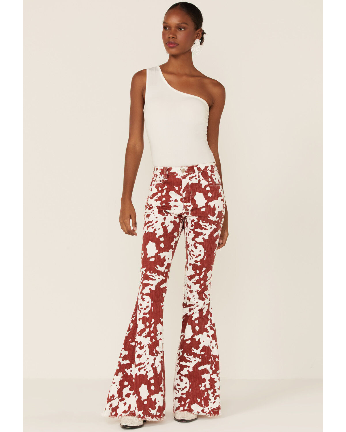 Image #1 - Saints & Hearts Women's Cow Print High Rise Raw Hem Flare Jeans, , hi-res