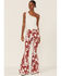 Image #1 - Saints & Hearts Women's Cow Print High Rise Raw Hem Flare Jeans, , hi-res