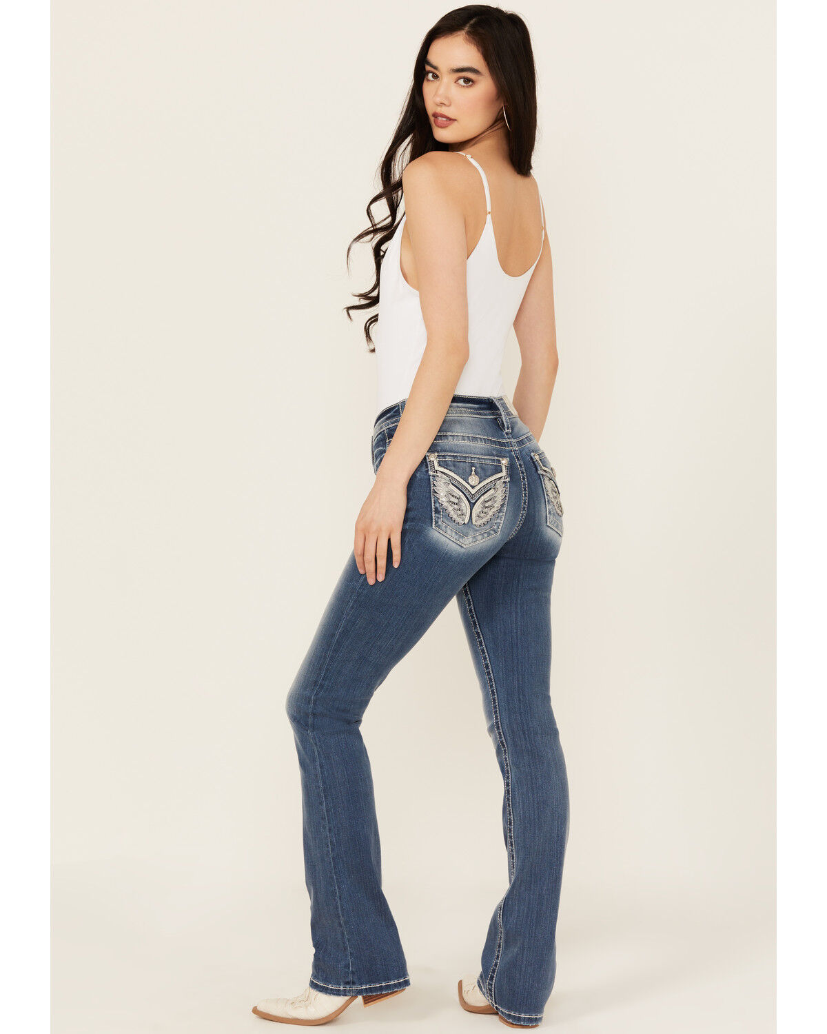 Image #1 - Miss Me Women's Medium Wash Mid Rise Wing Pocket Bootcut Stretch Denim Jeans, Medium Wash, hi-res