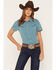 Image #1 - Howdy Hanny Women's Reef Waters Solid Short Sleeve Pearl Snap Performance Stretch Western Shirt, Ocean Blue, hi-res