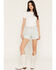 Image #1 - Wrangler Women's Sugar Light Wash High Rise Cowboy Stretch Denim Shorts, Light Wash, hi-res
