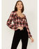 Image #1 - Wild Moss Women's Plaid Print Ruffle Tie Front Crop Top, Brown, hi-res