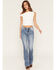 Image #3 - Miss Me Women's Medium Wash Mid Rise Fleur de Lis Pocket Bootcut Stretch Denim Jeans, Medium Wash, hi-res