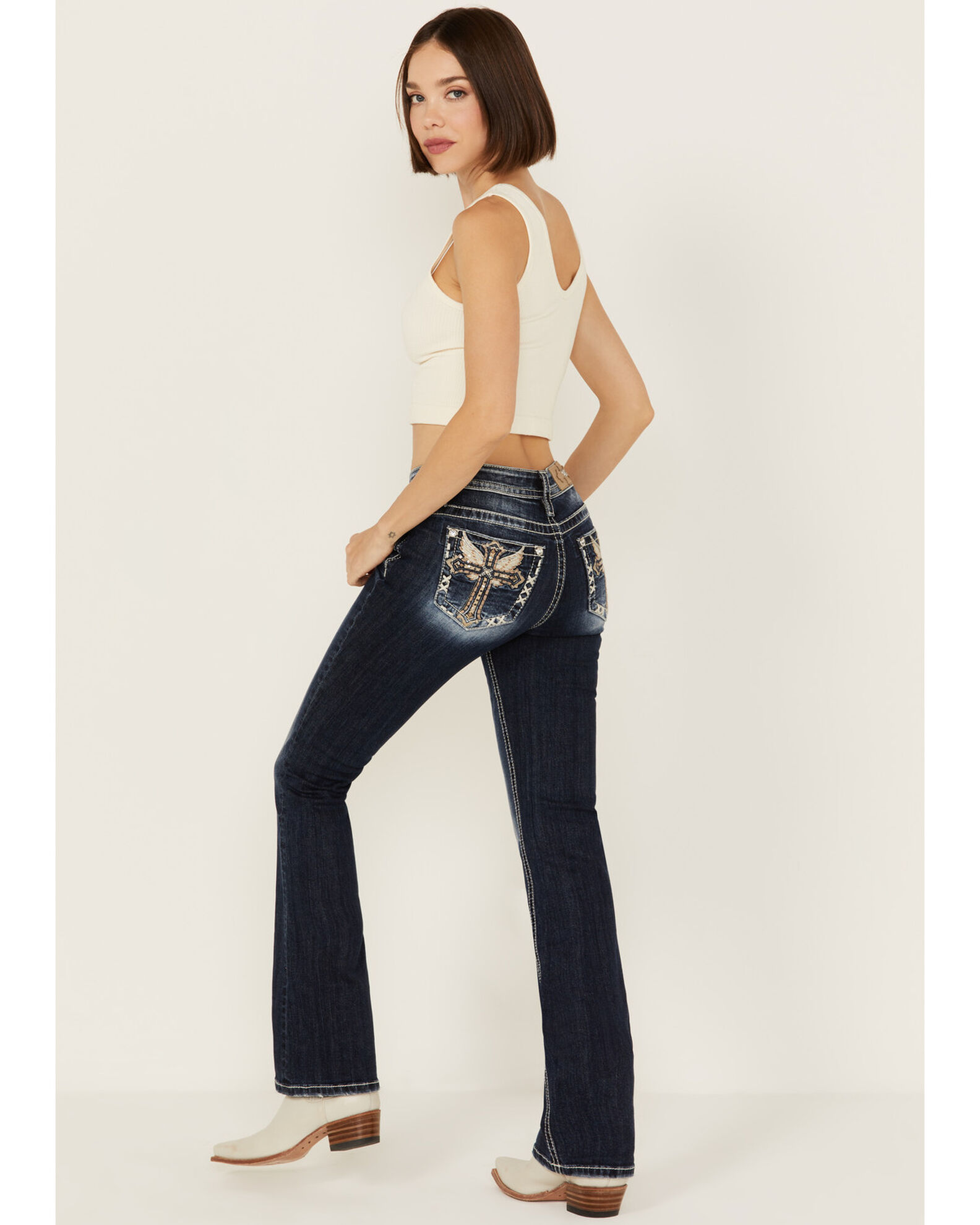 Miss Me Women s Dark Wash Mid Rise Angel Wing Cross Pocket Bootcut Stretch Denim Jeans Sheplers