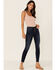 Image #1 - Shyanne Women's High Rise Fringe Hem Front Button Stretch Skinny Jeans, Dark Blue, hi-res