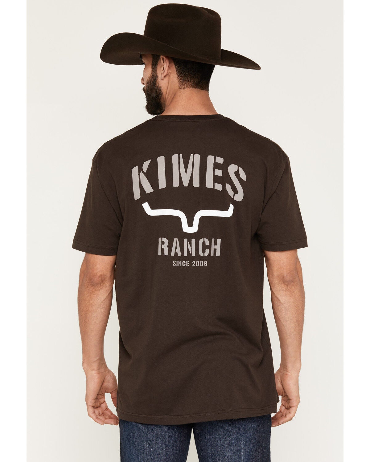 Image #1 - Kimes Ranch Men's Boot Barn Exclusive Stencil Logo Short Sleeve Graphic T-Shirt, Dark Brown, hi-res