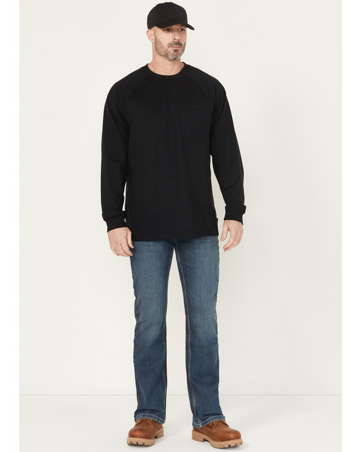 Image #1 - Cody James Men's FR Medium Wash Bozeman Bootcut Stretch Denim Work Jeans, Medium Wash, hi-res