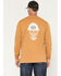 Image #1 - Ariat Men's FR Roughneck Skull Logo Long Sleeve Graphic Work Shirt, Mustard, hi-res